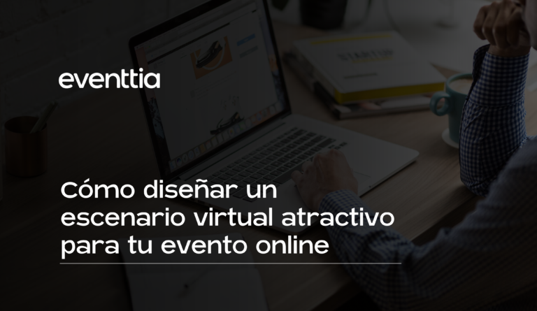 hombre sentado enfrente del computador con una taza de café y libros