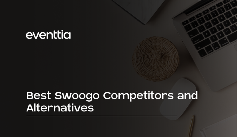 desk with laptop mouse pen paper swoogo competitors